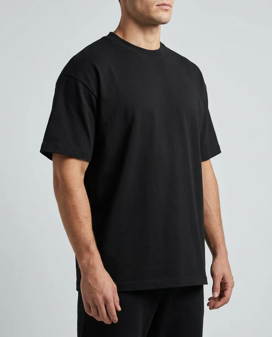 Black oversize t-shirt over jeans, made by GAT