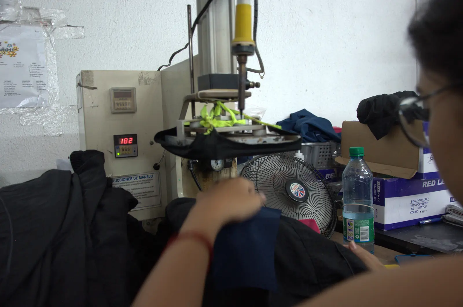 Industrial heat press with temperature control used for transfers and labeling at GAT