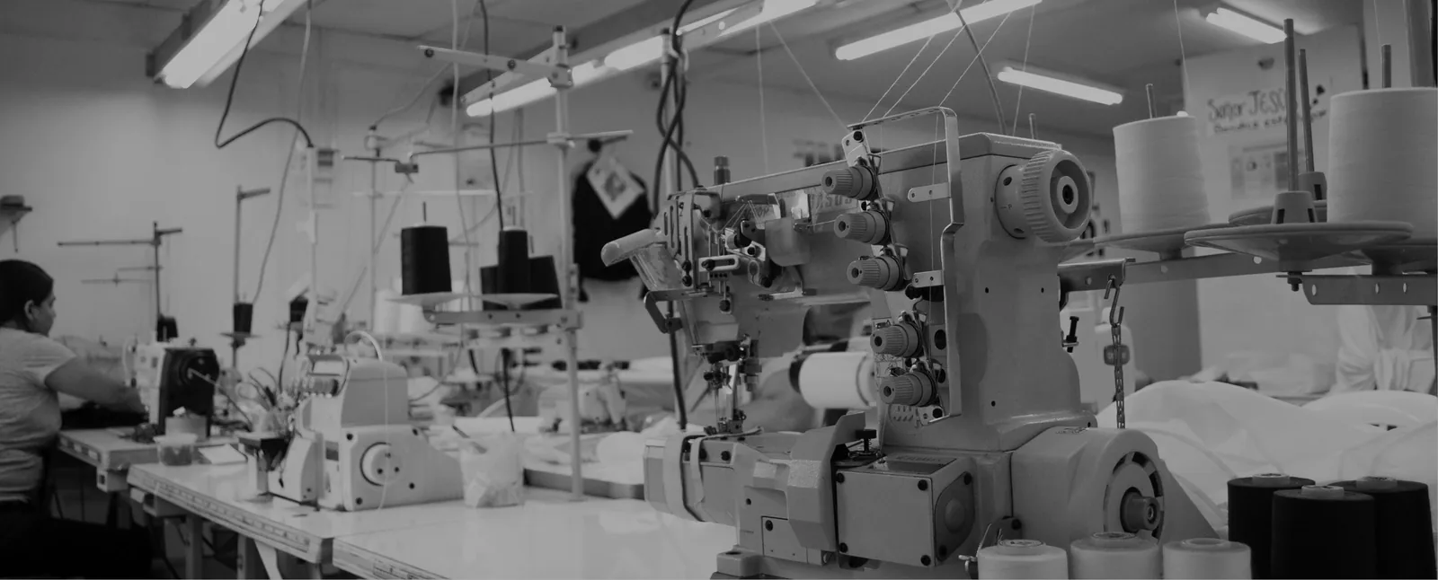 Black and white panoramic view of GAT garment production floor